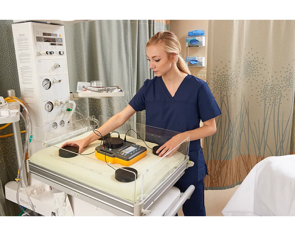 Biomed testing a neonatal unit