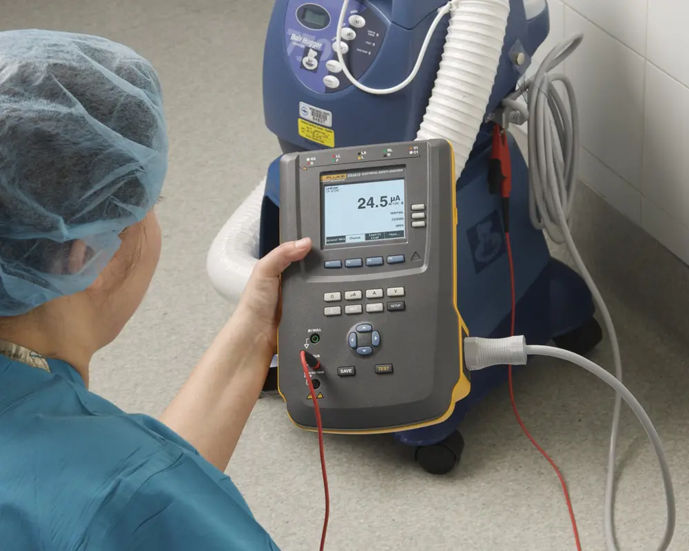 Biomed technician using an ESA615
