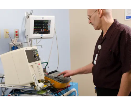 Impulse 7000DP testing defibrillator