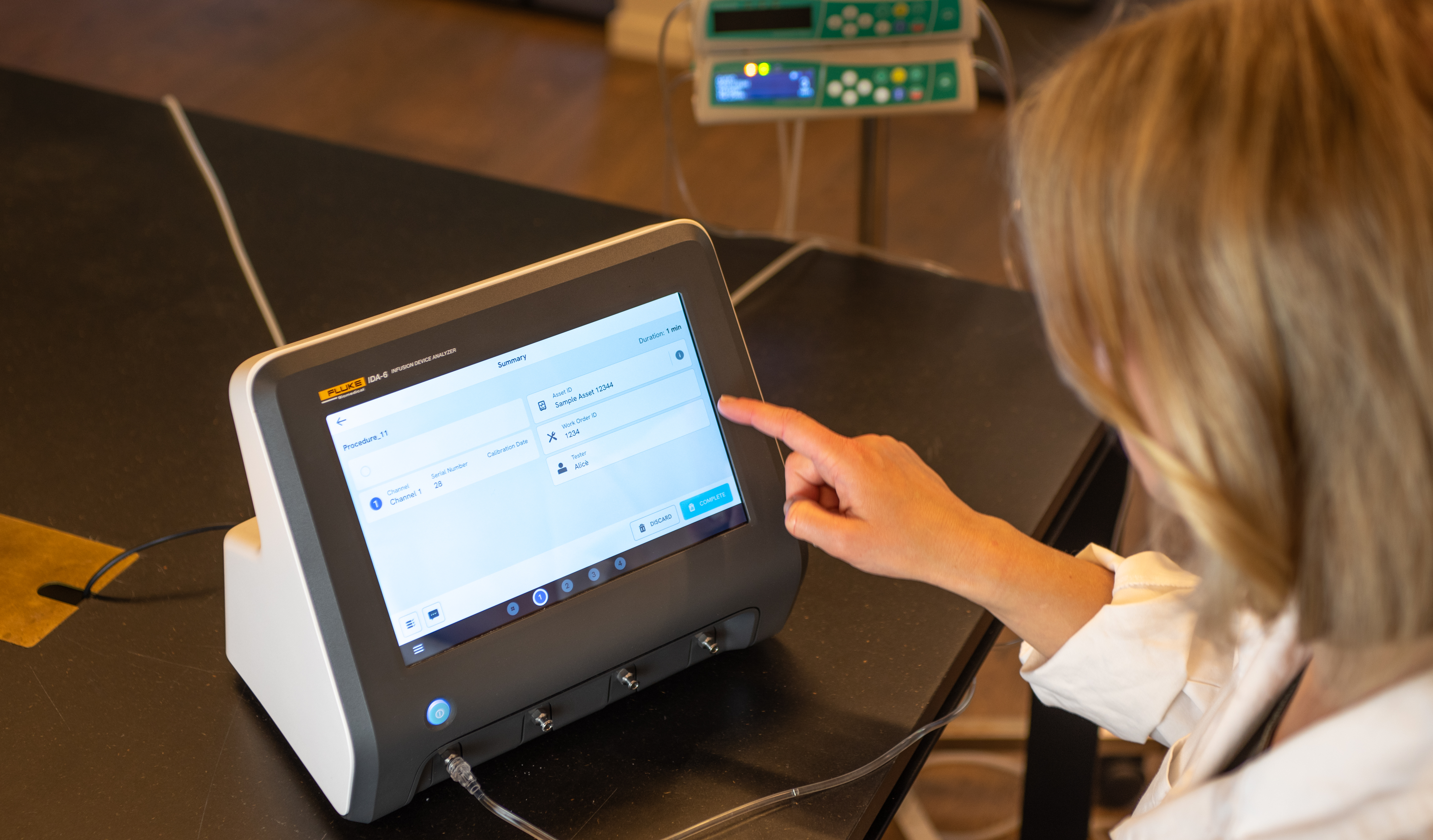 Technician selecting option on IDA-6 touchscreen