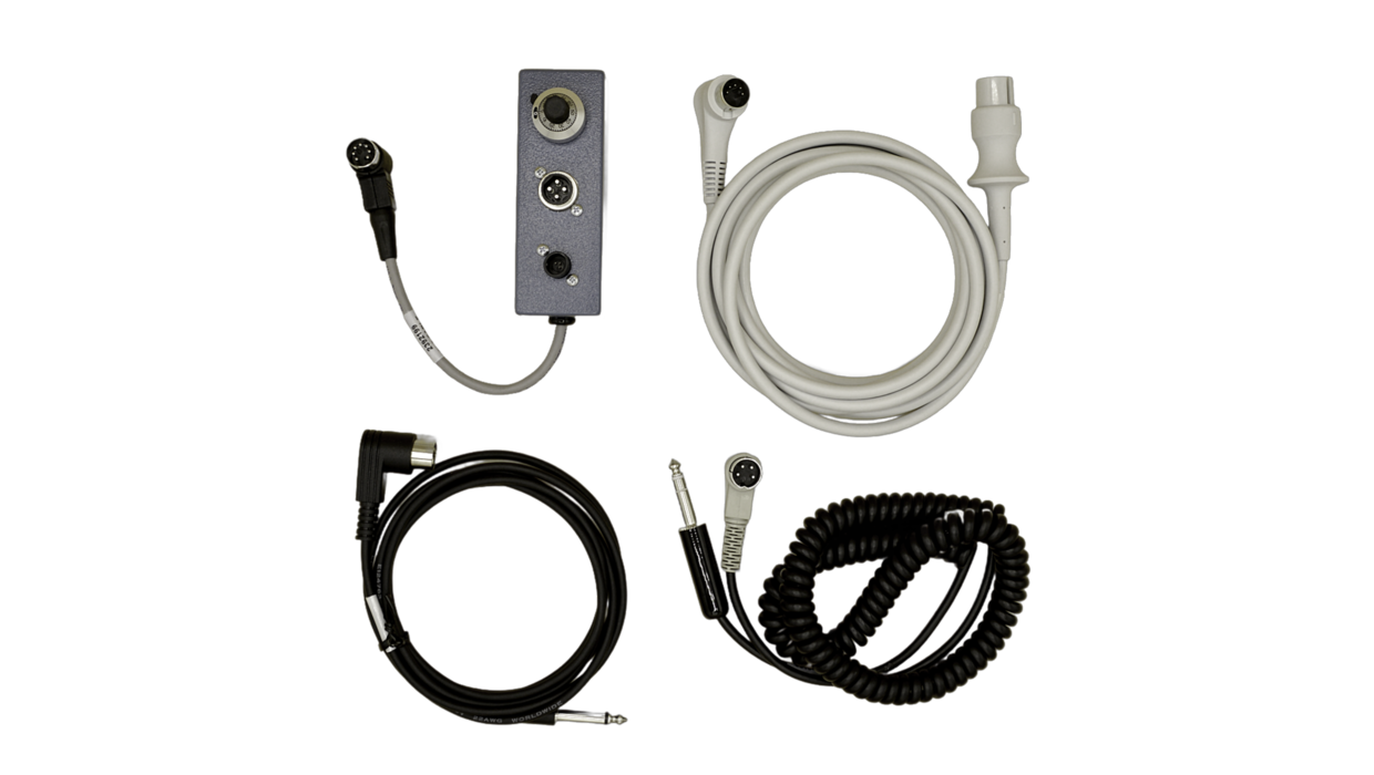 Two black cables, one white cable, one blue box with cable